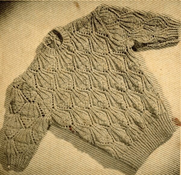 Twee jumpers met kantpatroon