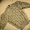 Twee jumpers met kantpatroon
