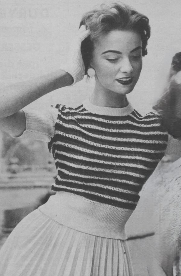 Damesjumper met geborduurde pas